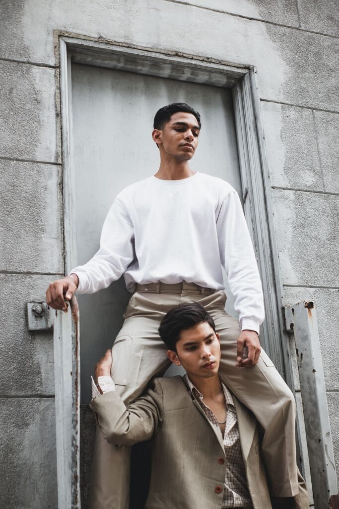 White crewneck outfit with a blazer held over one shoulder